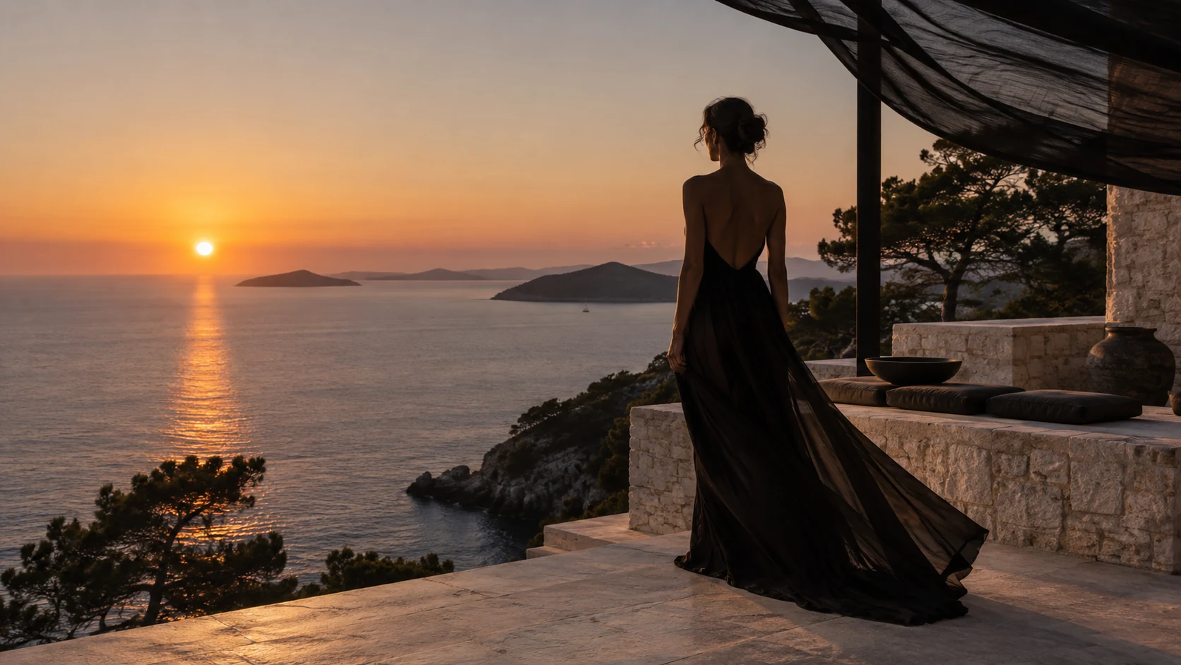 Woman overlooking the Adriatic at sunset